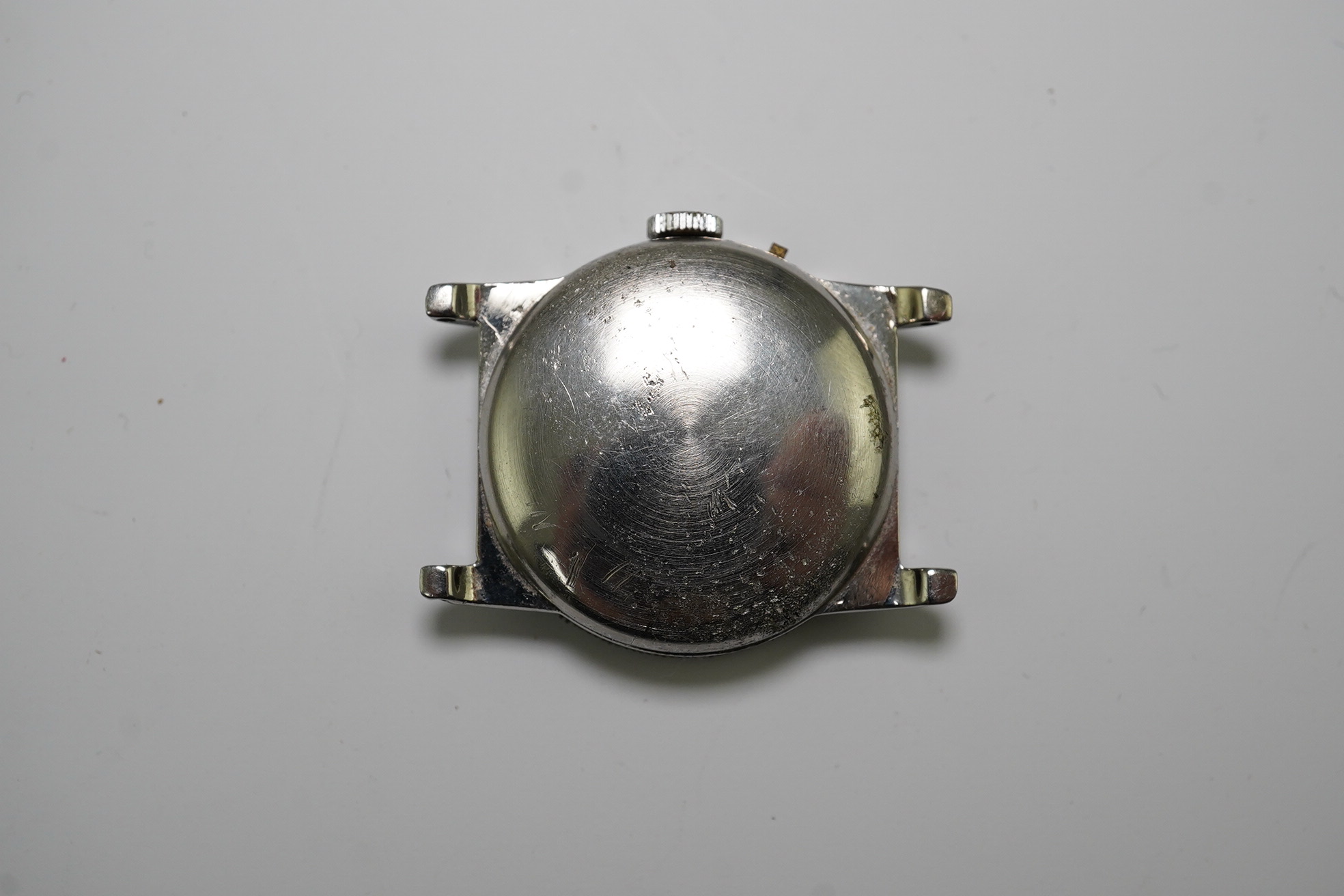 A gentleman's late 1930's steel Longines Weems U.S Patent military pilot's manual wind wrist watch, with Arabic dial, movement c.10L, case diameter 28mm, lacking one crown, no strap. Condition - poor